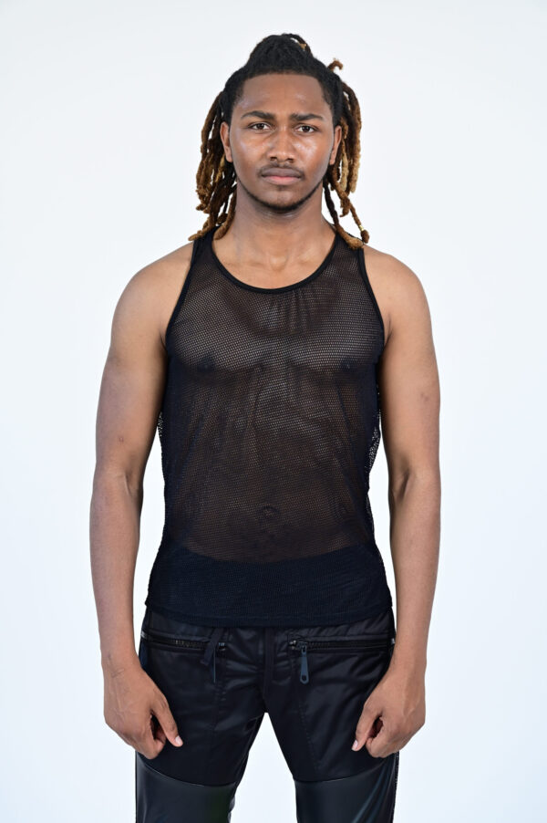 Man wearing a black mesh tank top.