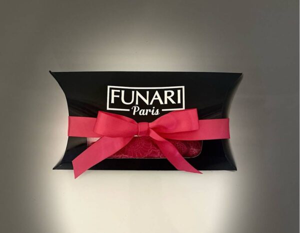 Black gift box with pink ribbon.