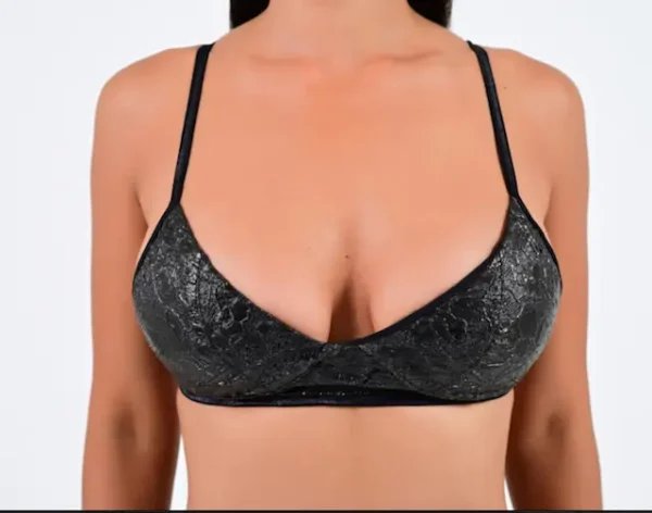 Black lace bralette on a model.