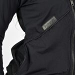 Black jacket with zipper and patch detail.